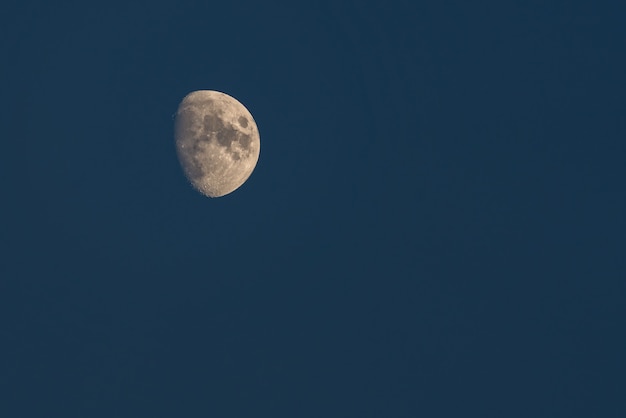 Crescent moon on dark night sky