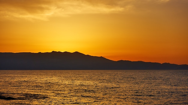 Crete Island, Greece. Silhouette against the sunset sky