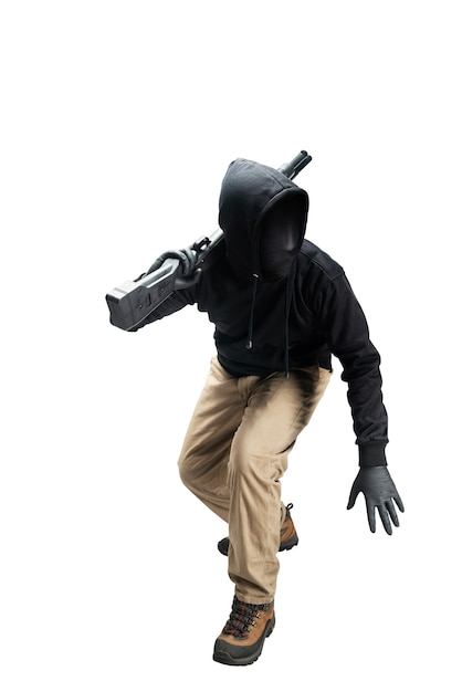 Criminal man in a hidden mask holding the shotgun isolated over white background