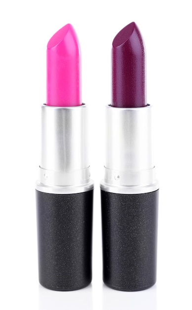 Crimson and cherry blossom lipsticks isolated on white