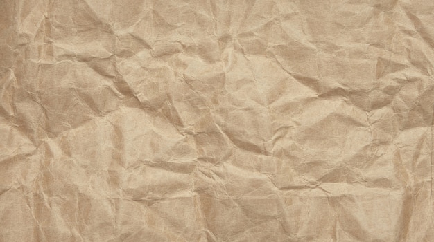 Crinkle crumpled kraft paper background with textured