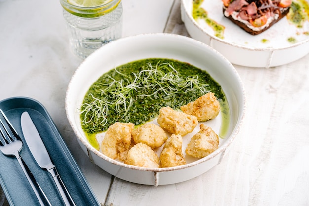 Crispy cauliflower with pesto closeup