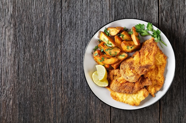 Crispy Chicken Cutlets with spicy roasted potatoes