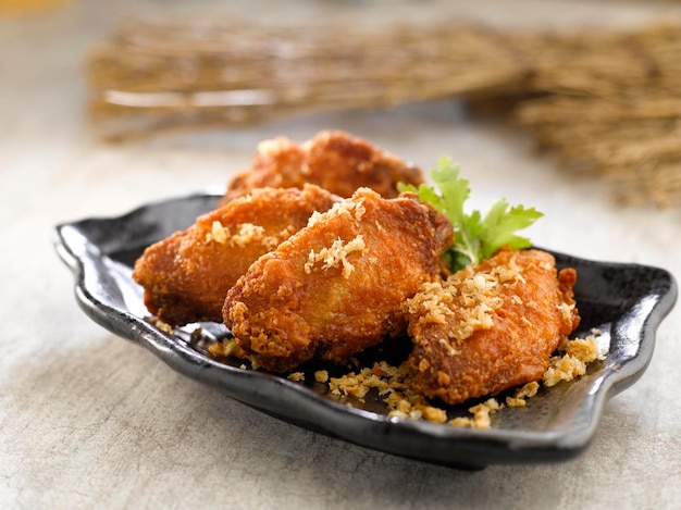 Crispy Chicken Mid Joint wings with Prawn Paste served dish isolated on background top view food