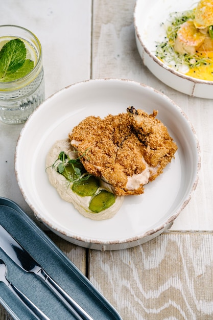 Crispy chicken with tofu sauce and pickled cucumbers