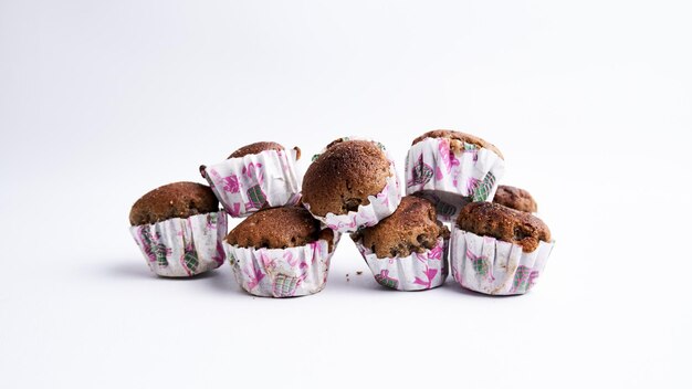 Crispy chocolate muffin isolated on a white background