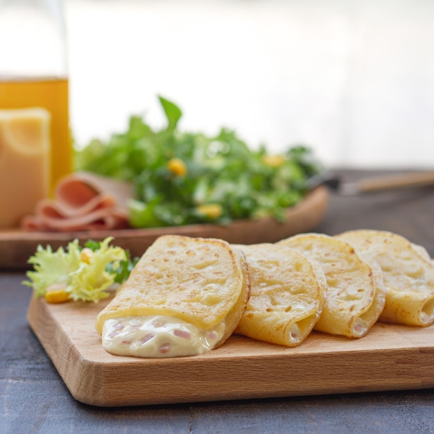 Crispy fried food with chicken cheese and ham crepe Salad to accompany