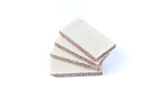 Crispy wafer with chocolate filling isolated on white background