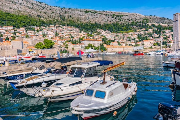 Croatia. Port and view of Dubrovnik old town on summer day.