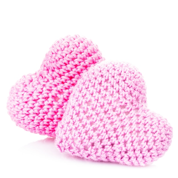 Crochet hearts isolated on white. Love concept