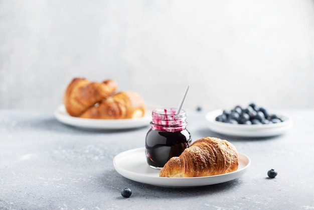 Croissant and blueberry jam