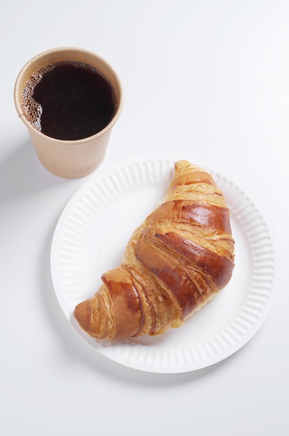 Croissant and coffee cup