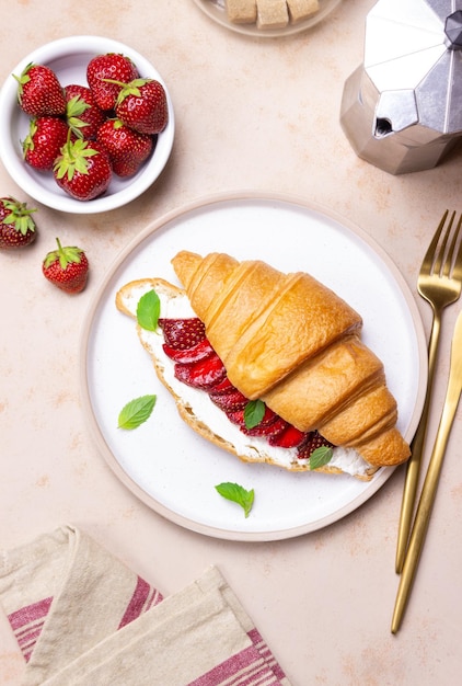 Croissant with strawberries white cheese and mint Breakfast Vegetarian food