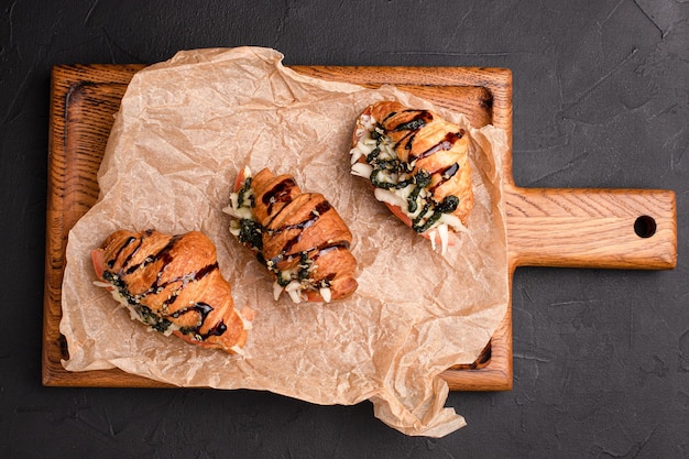 Croissants with fillings croissants with different fillings on a black background