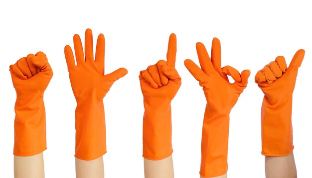 Photo cropped hand gesturing while wearing gloves against white background