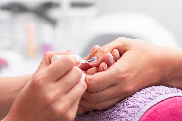 Cropped hands of doctor examining patient