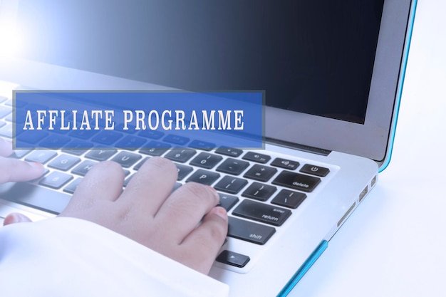 Photo cropped hands of woman using laptop against white background