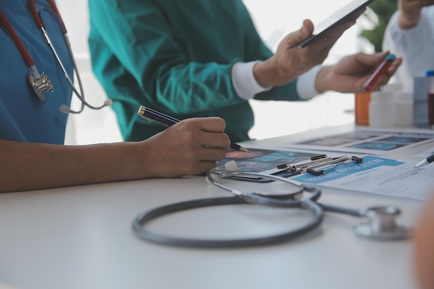 Cropped image of successful medical doctors discussing diagnosis during the conference