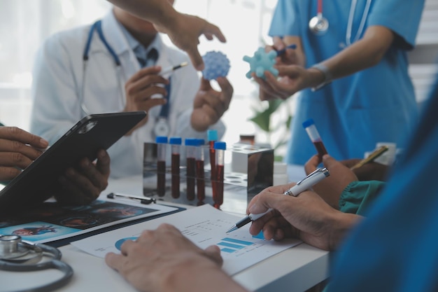 Cropped image of successful medical doctors discussing diagnosis during the conference