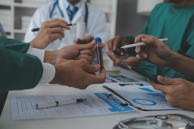 Cropped image of successful medical doctors discussing diagnosis during the conference