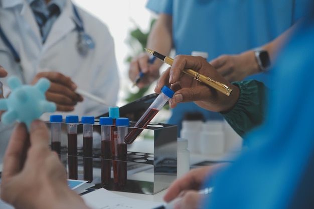 Cropped image of successful medical doctors discussing diagnosis during the conference