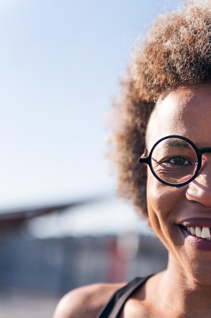 Cropped portrait of an african smiling woman