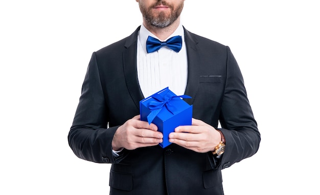 Cropped view of man holding gift for occasion tuxedo man with occasion present isolated on white