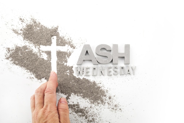 Cross made of ashes ash wednesday lent season abstract background