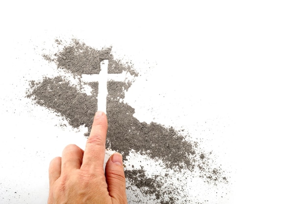 Cross made of ashes ash wednesday lent season abstract background