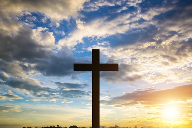 The Cross at the sunset background