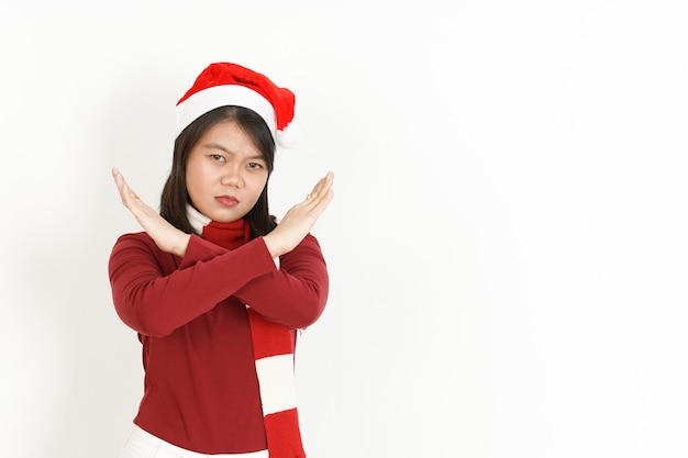 Crossed Hand and stop sign of Beautiful Asian Woman Wearing Red Turtleneck and Santa Hat