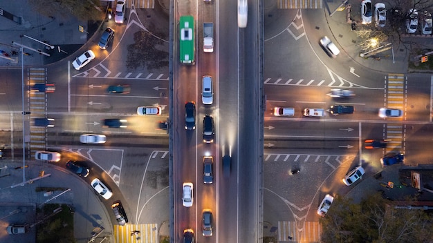 A crossroads with a lot of cars buses and trucks