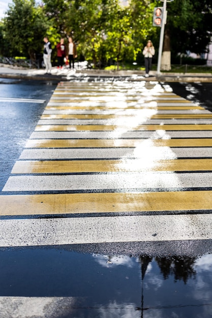 Crosswalk on the road for safety when people walking cross the street pedestrian crossing on a repai...