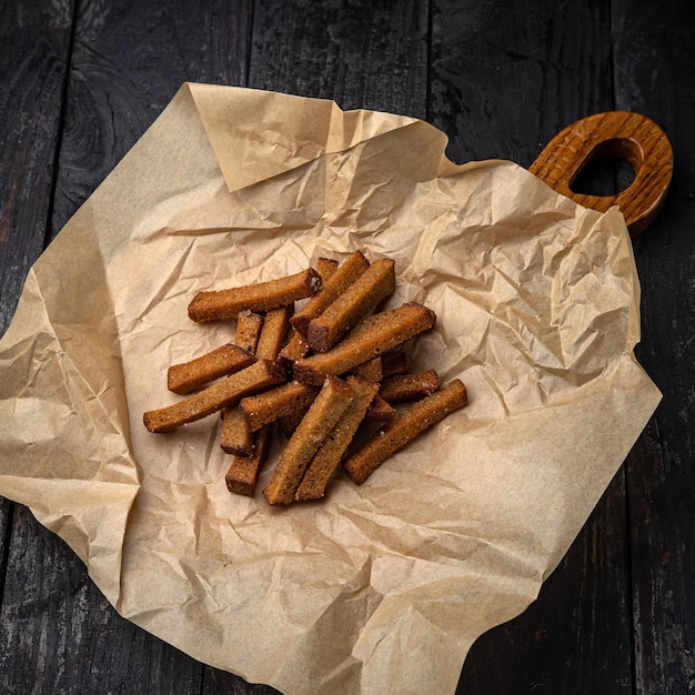 croutons on a dark wooden table