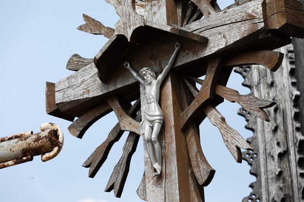 Crucifixion of Christ and a large number of crosses at Hill of Crosses. Hill of Crosses is a unique monument of history and religious folk art in Siauliai, Lithuania.