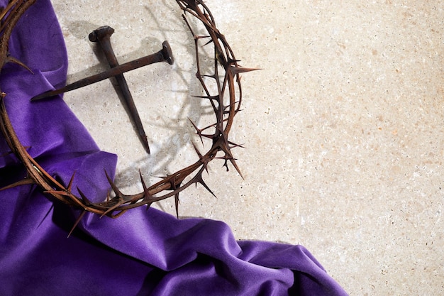 Crucifixion of jesus christ cross with three nails and crown of thorns on ground