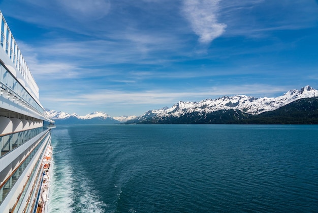 Cruise boat wake leaving town of Valdez in Alaska