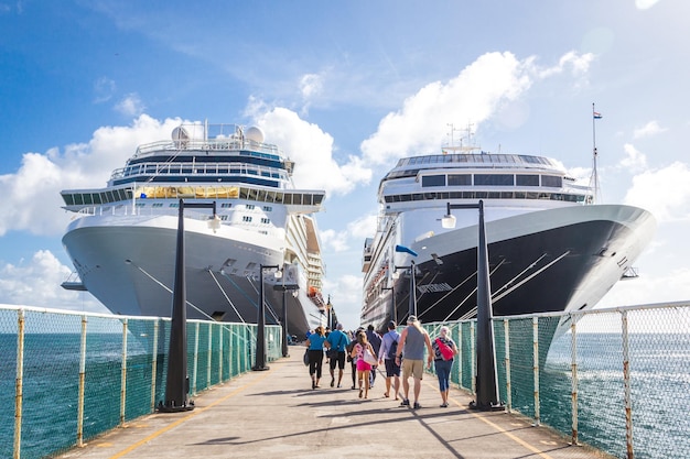 Photo cruise passengers return to cruise ships at st kitts port zante cruise ship terminal