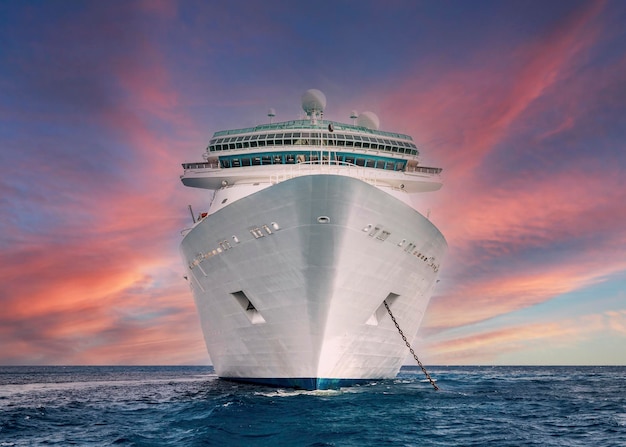 Cruise ship in caribbean sea at sunset landscape with big cruise liner