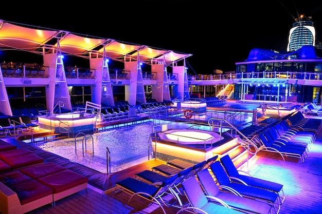 Cruise ship docked in a Charlotte Amalie bay before departing to a scenic Caribbean vacation