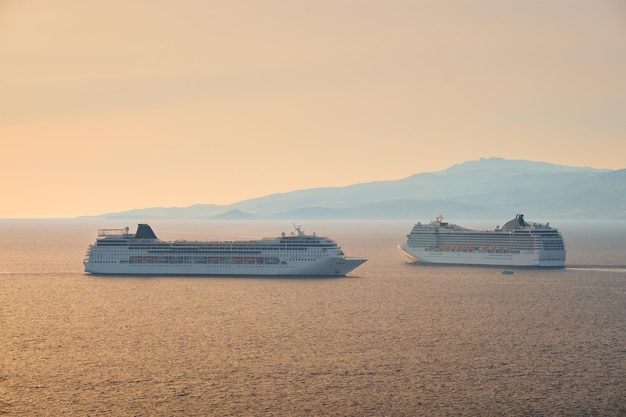 Cruise ships in Aegean sea on sunset