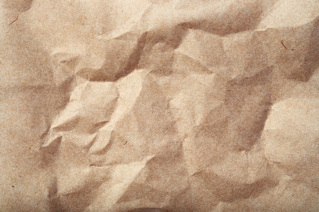 Crumpled beige paper texture