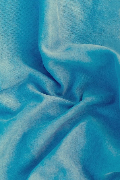 Crumpled blue towel with pleats