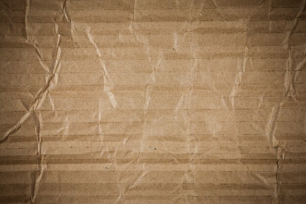 Crumpled brown cardboard texture.