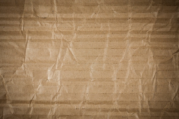 Crumpled brown cardboard texture.