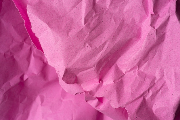 Crumpled recycle pink paper background. Pink paper crumpled texture for backdrop