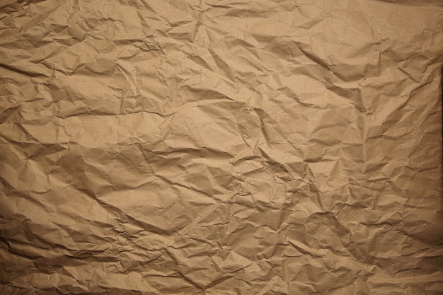 a crumpled sheet of brown wrapping paper