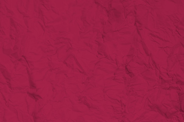 Crumpled viva magenta paper background