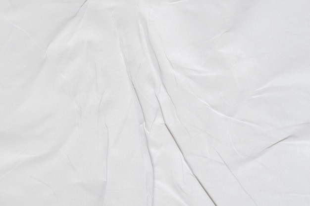 Crumpled white paper texture background.