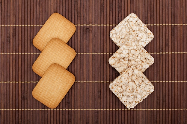 Crunchy rye crispbreads vs cookies, health concept